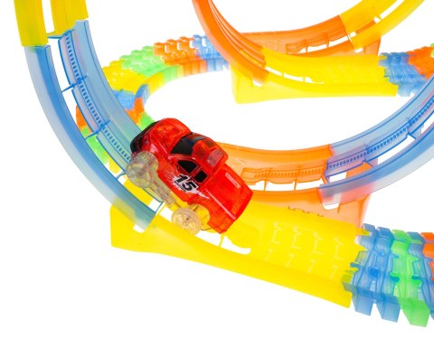 Fluorescencyjny Tor Wyścigowy dla dzieci 3+ Elastyczne części 148 el. + Autko z LED + 3 Pętle 360 Fluorescencyjny Tor Wyścigowy dla dzieci 3+ Elastyczne części 148 el. + Autko z LED + 3 Pętle 360